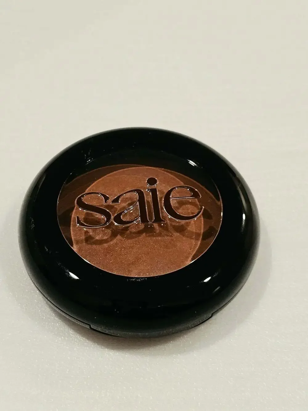 Saie brand SUPERSUEDE™ Radiant Baked Bronzer in the shade Bari